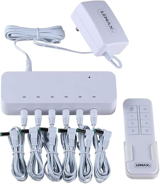Boîtier Lemax 54521 avec ses six sorties et sa télécommande